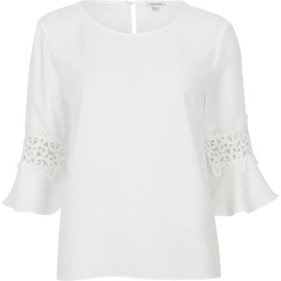 White lace insert bell sleeve top